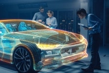 工程团队在汽车研究实验室中分析电动汽车的性能。