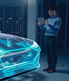 Ingeniero automotriz diseñando la arquitectura de un EV.